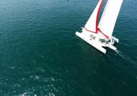 aerial photo of trimaran sailing yacht